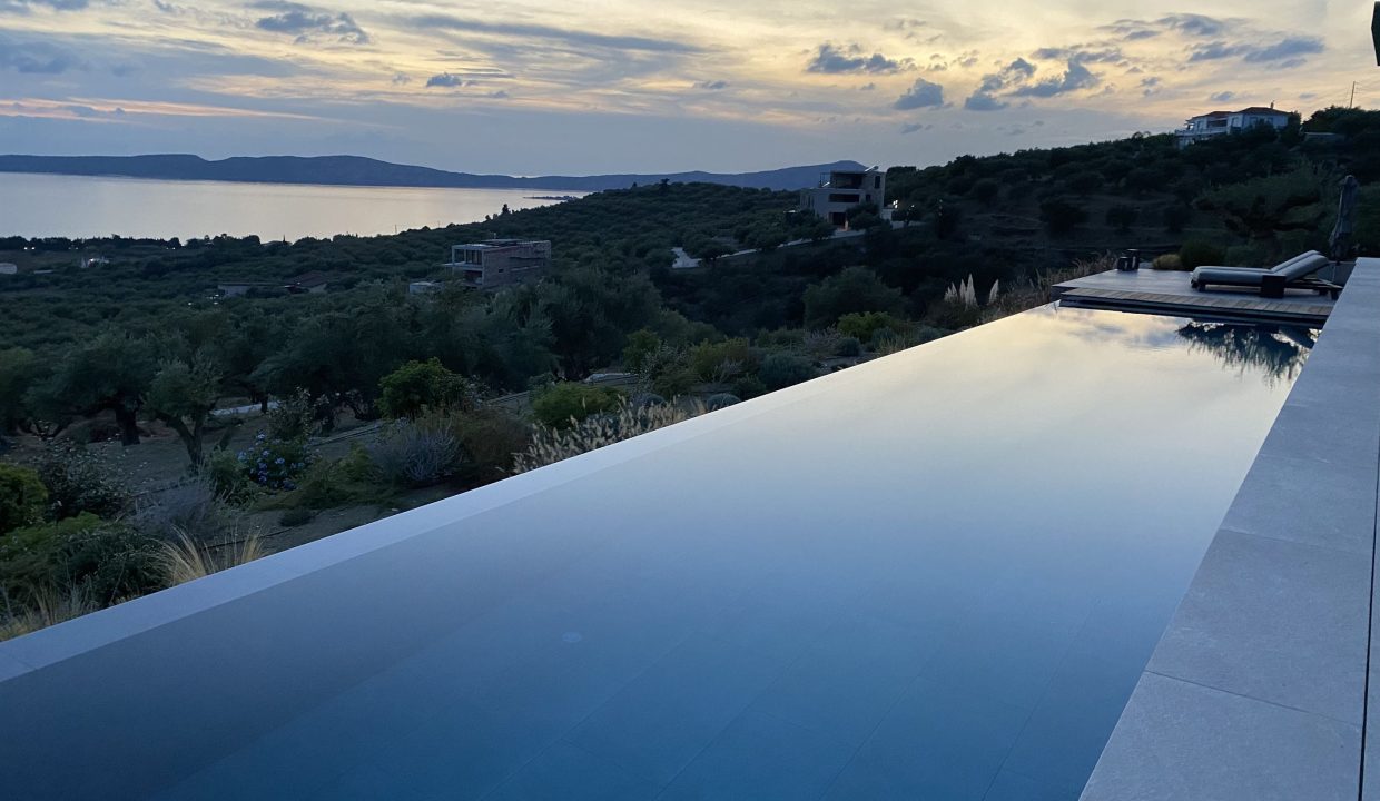 the-bay-villa-terrace-view-pool-sunset